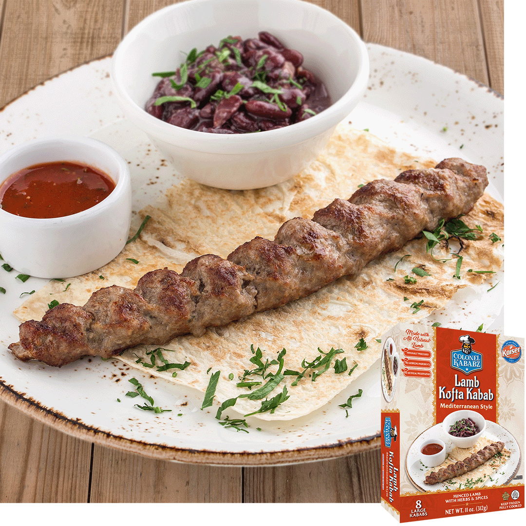 lamb kofta kabab resting on a thin piece of bread, beside it is small bowl with a red sauce and slightly larger white bowl with chopped olives. The product is garnished with chopped cilantro. In the bottom right hand corner is an image of the product package