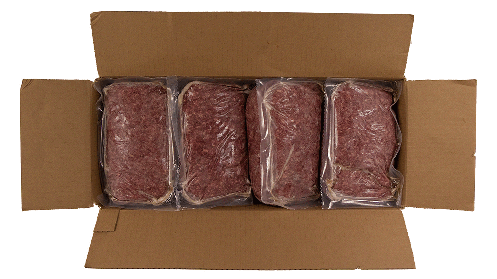 an open cardboard case of 20 pound packages of ground beef