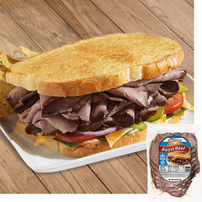 a roast beef sandwich on white bread, the roast beef is piled high and resting on a bed of red onions, tomatoes, colby jack cheese, peppers, and a white condiment. In the bottom right corner is an image of the product package