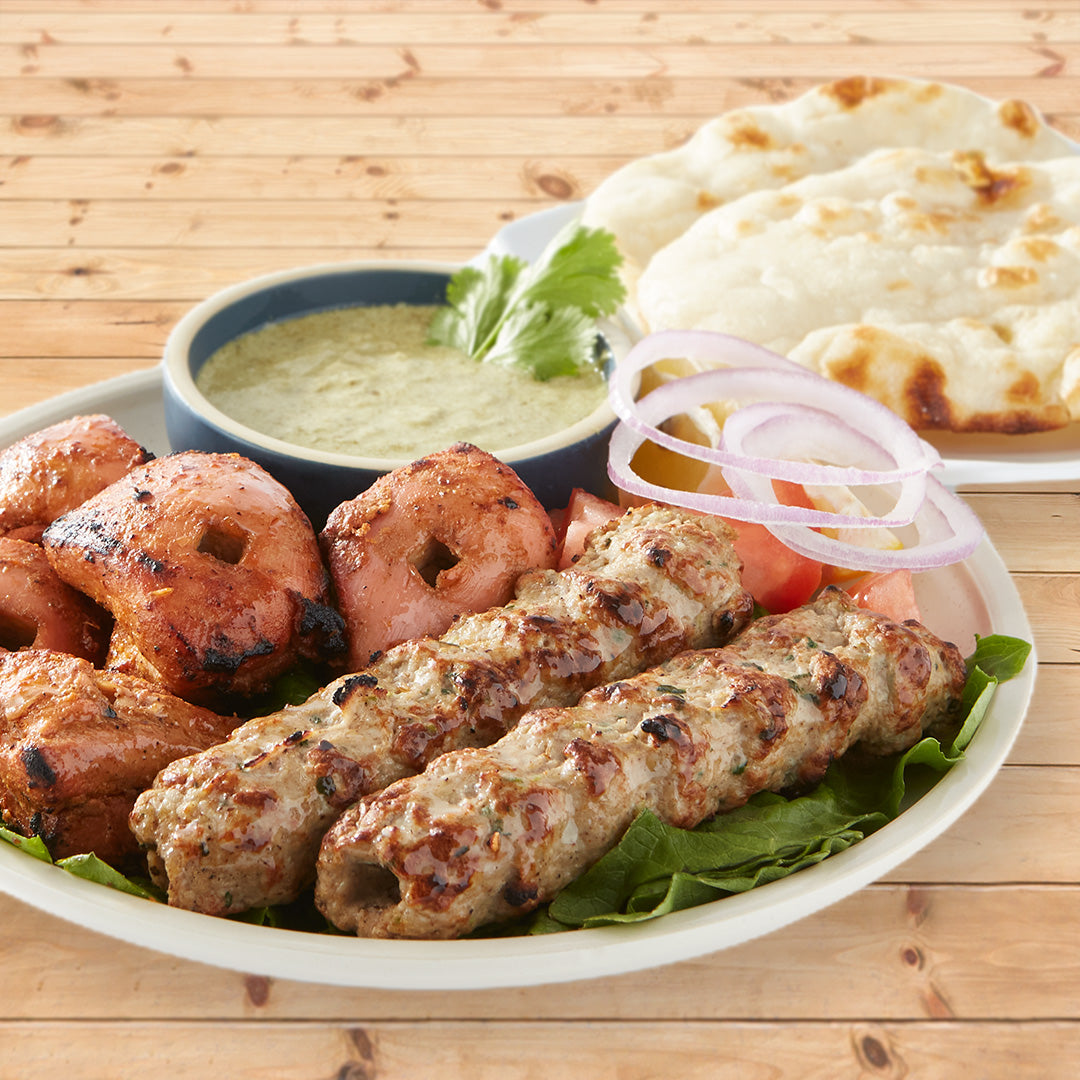 Tandoori Grill Platter with Chicken kababs, chicken tikka, chutney and naan